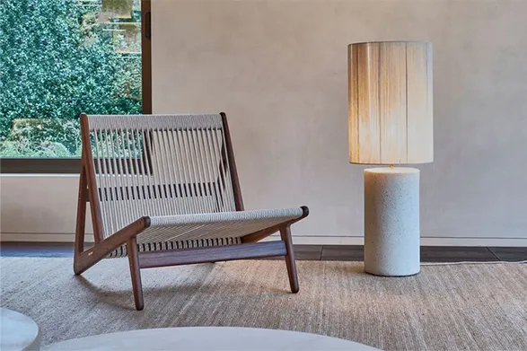 A stunning concrete floor lamp by Mon Dada, a Belgian brand celebrated for its artisanal craftsmanship and contemporary minimalist designs. This elegant lamp features a sleek cylindrical concrete base that exudes a refined, modern aesthetic. The warm glow of the lamp complements the natural texture of the concrete, making it a perfect statement piece for any sophisticated interior. Mon Dada is known for its commitment to high-quality, eco-friendly materials, and this lamp beautifully showcases their dedication to both form and function.