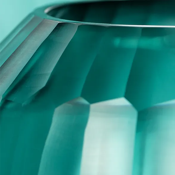GUAXS is renowned for its high-quality glass objects, each piece meticulously crafted by master glassblowers. The brand's philosophy centers on creating timeless designs that celebrate the interplay of light, color, and form.